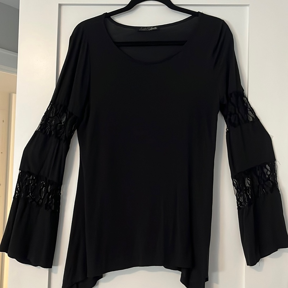 Long sleeve black shirt with lace inserts on sleeves